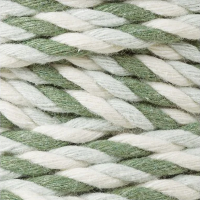 Close-up of 3-ply Magic Green cord, made of twisted strands of white, light blue, and green.