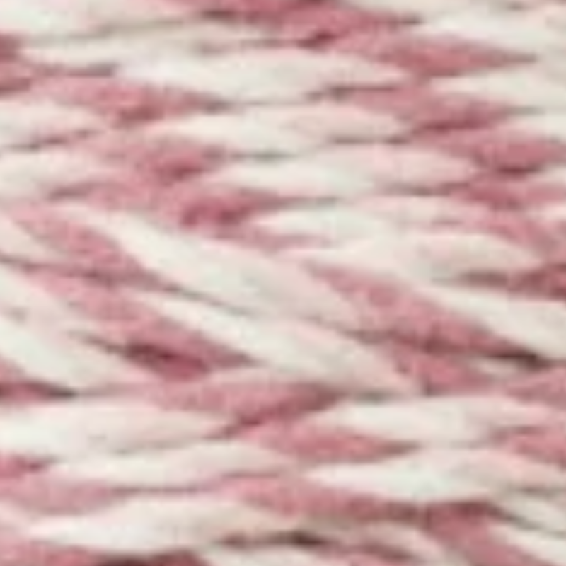 Close-up of 3-ply Magic Pink cord, made of twisted strands of white, light pink, and pink.