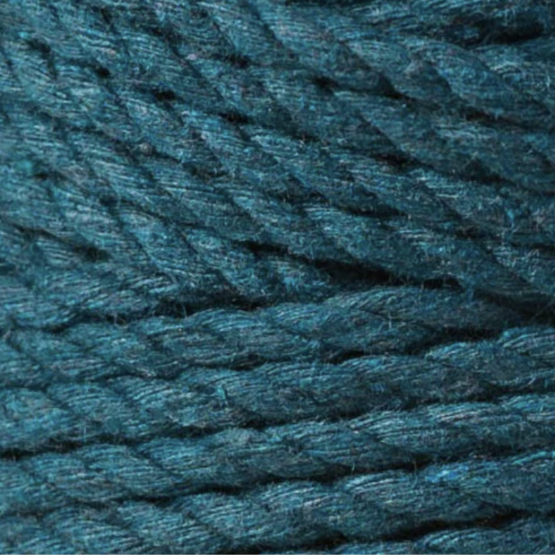 Close-up of rich blue cord with a textured pattern.